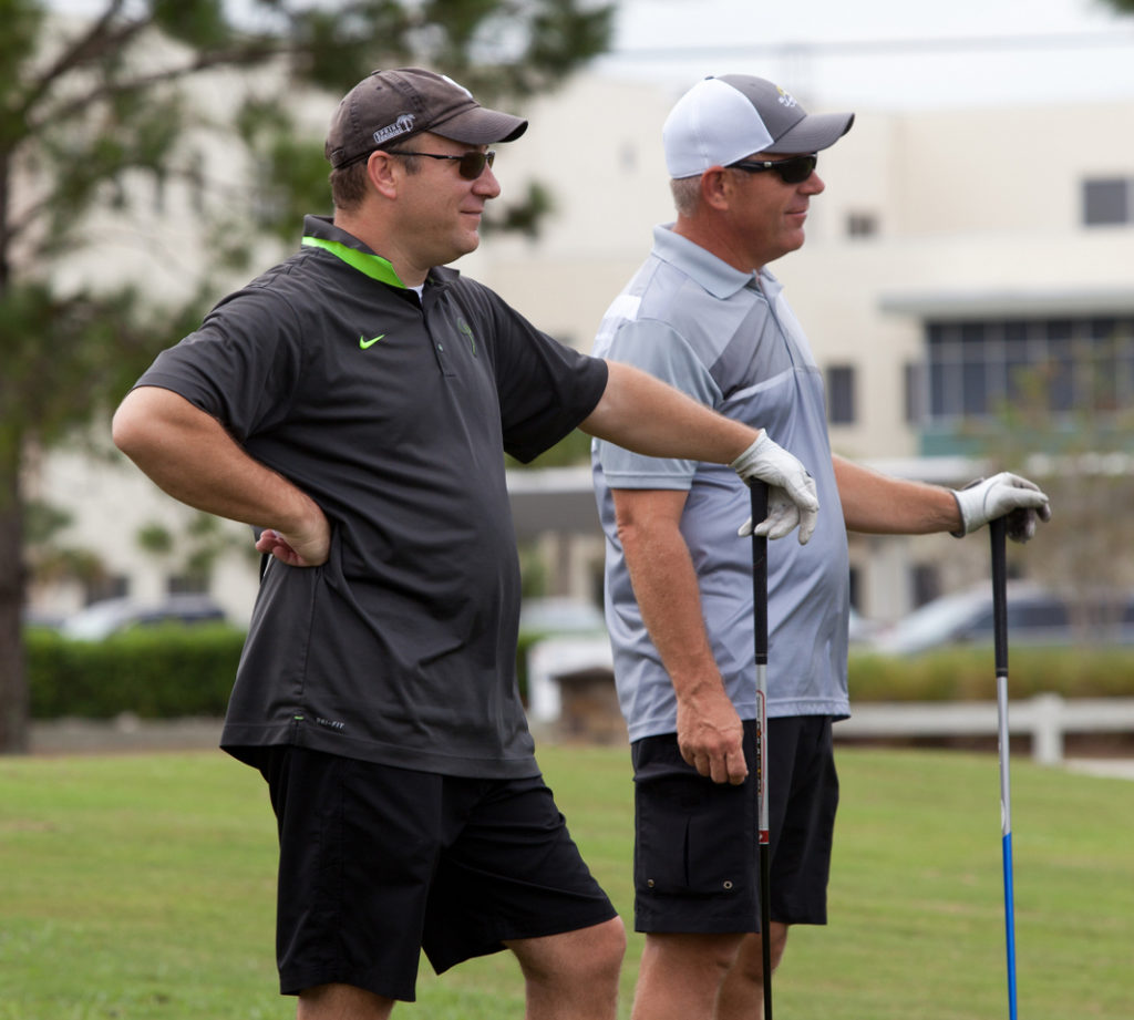 Two men golfing