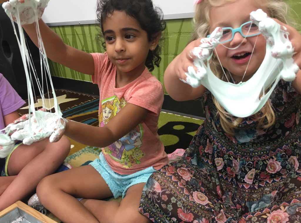 Children playing with putty