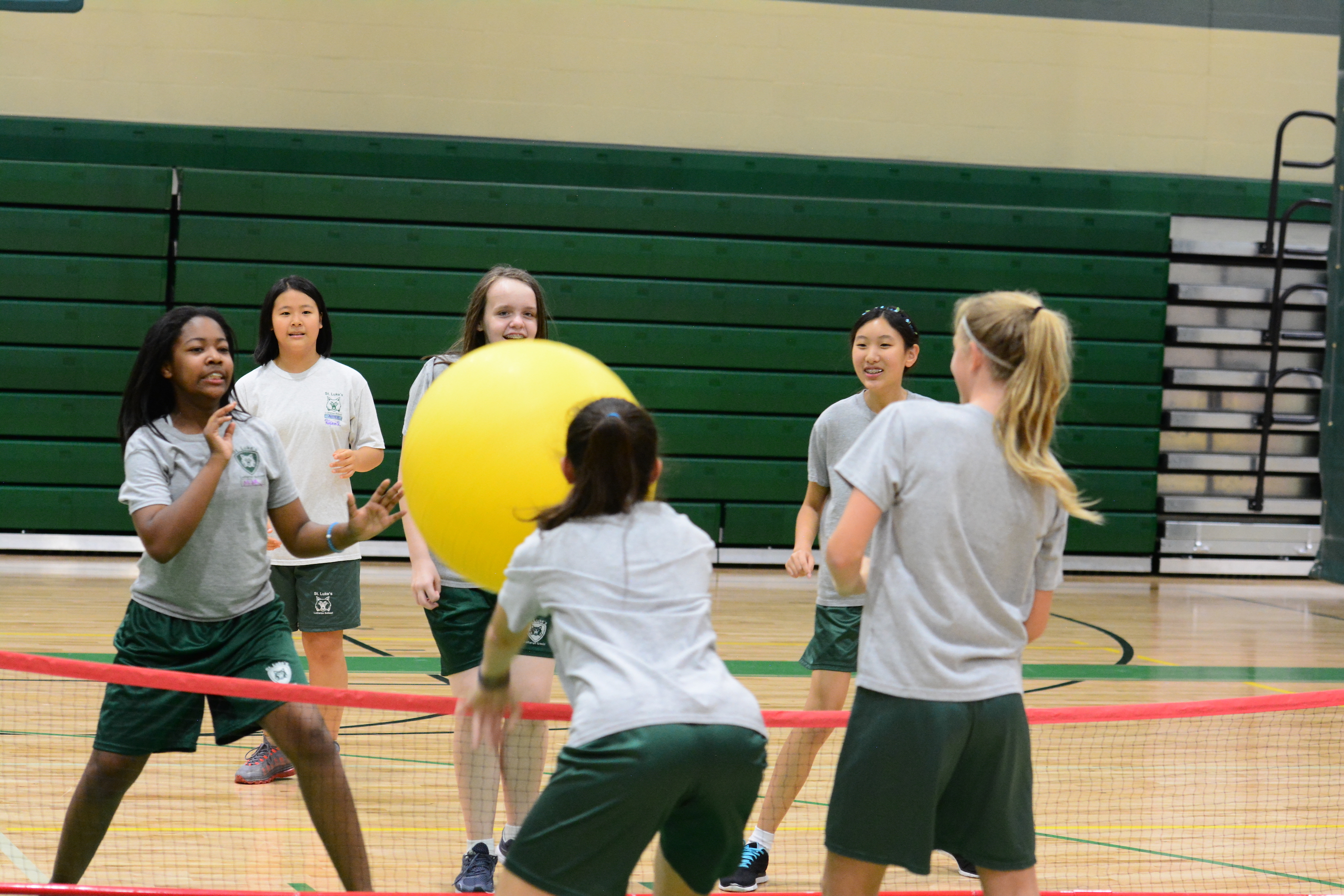 Middle Schoolers Playing Giant Volleyball at P.E.